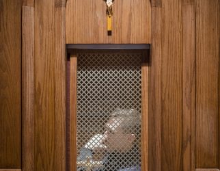 a wooden wall with a crucifix on it