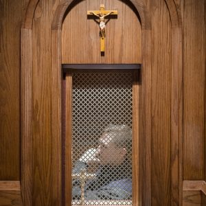 a wooden wall with a crucifix on it